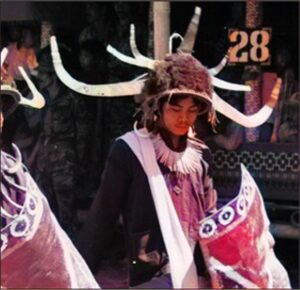 Men parading in warrior dress
