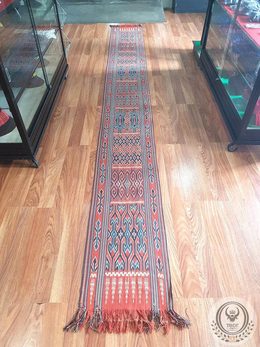 Sekomandi Sambo Tanete (Pori Lonjong) - Natural Dye Ikat Weaving (47x 430cm) Sekomandi Sambo Tanete (Pori Lonjong) - Natural Dye Ikat Weaving (47x 430cm)